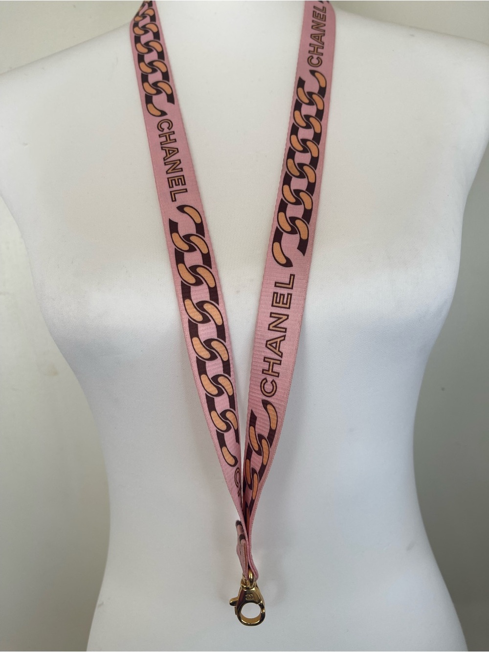 CHANEL Pink Chain-Print Lanyard with Gold Hardware